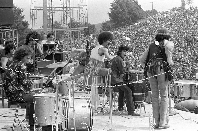 Woodstock - A young Carlos Santana performs with his band