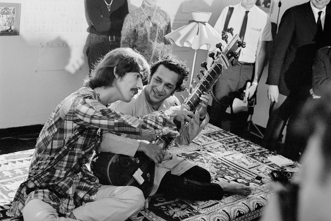 George Harrison and Ravi Shankar.