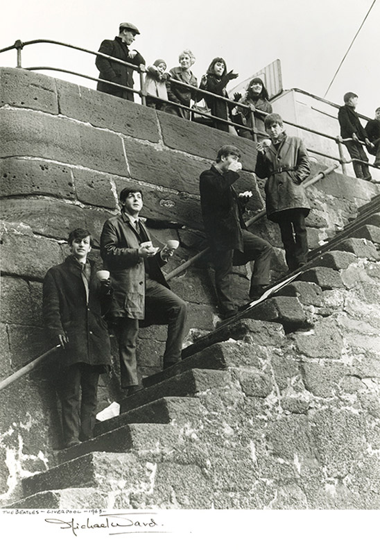 The Beatles on steps